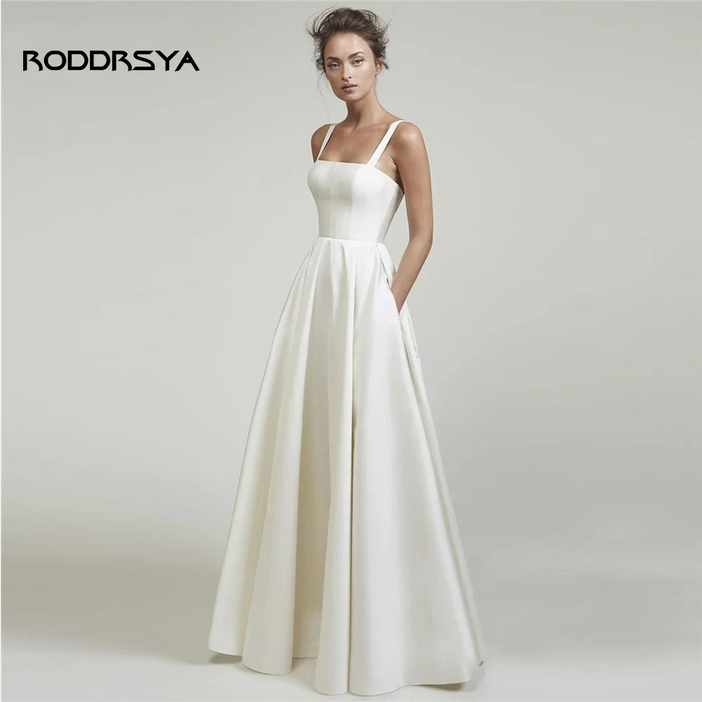Vestido de Noiva em Cetim com Alças Finas, Bolsos e Costas Abertas